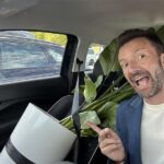 Clemens-Schrettl-plant-car The head of marketing and sales of Spairliners is driving in his car, transporting a new plant for the office in Hamburg.